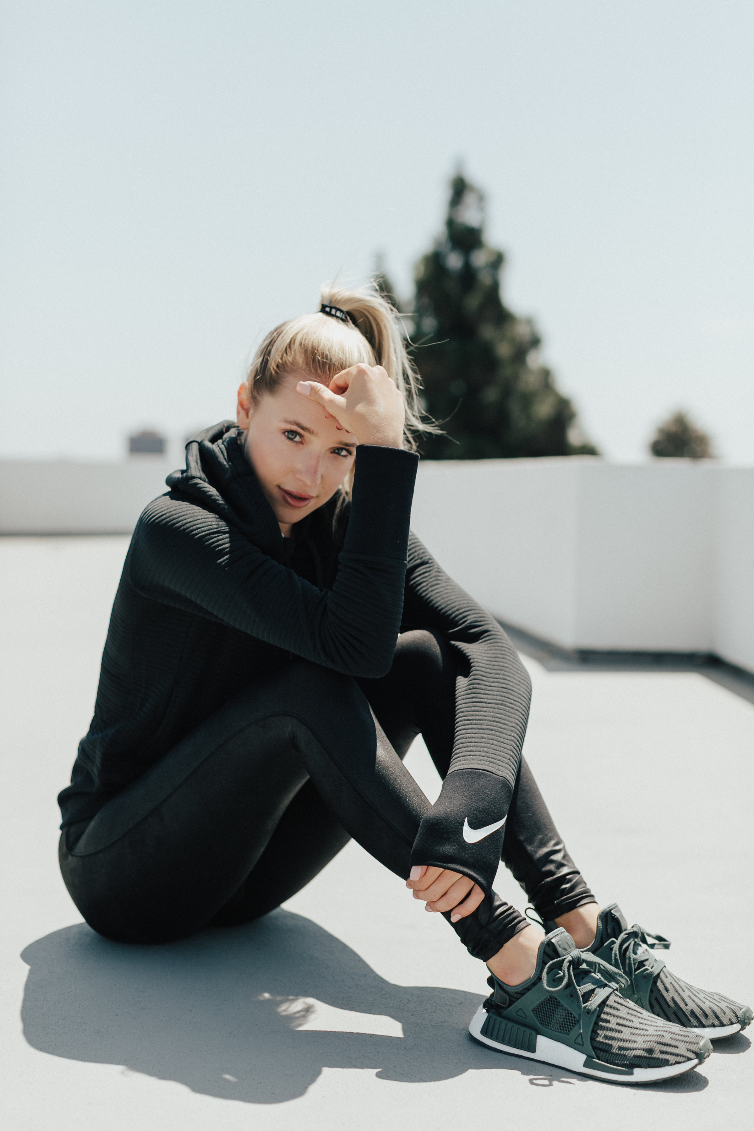 Blogger Payton Sartain wears Adidas Originals and Nike from Finish Line