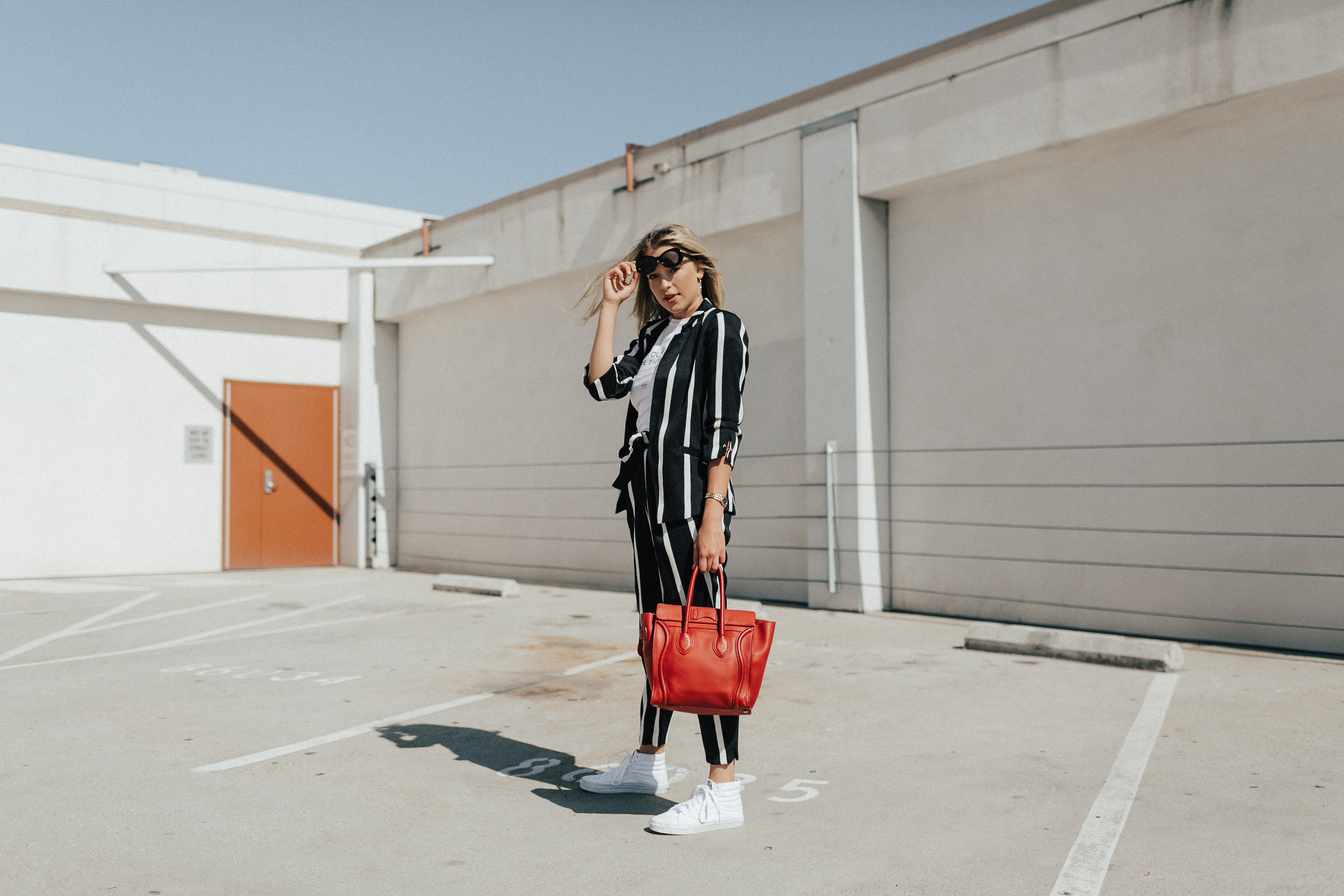 Los Angeles Blogger Payton Sartain wears River Island's Black Stripe Suit for Fall